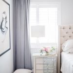 bedroom curtains feminine bedroom with violet curtains, a creme upholstered headboard, and a AUJPNMW