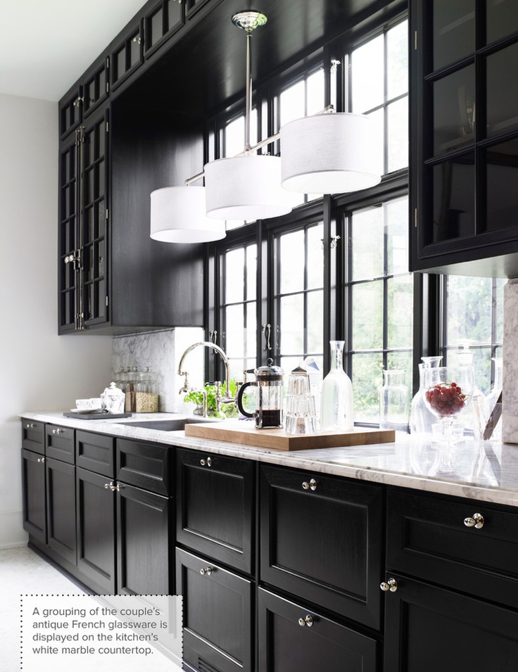 black kitchen cabinets natural light as balancing feature. GYBLWIK