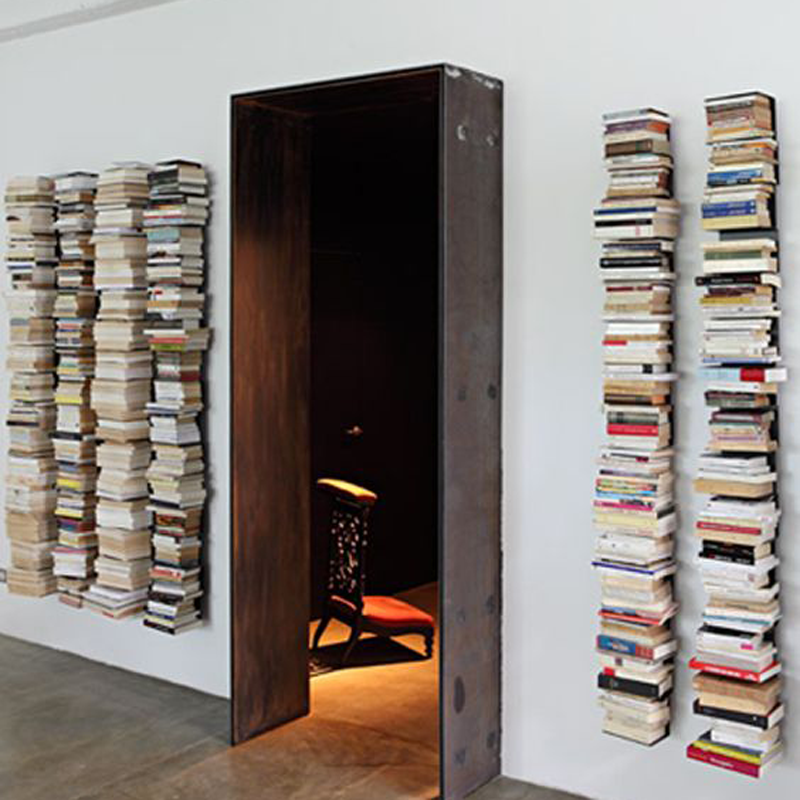 floating bookshelves next to door IXARMRA