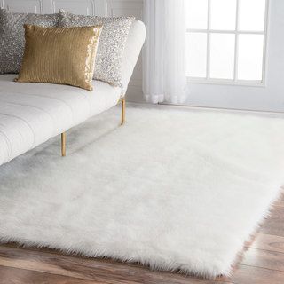 fur rugs shop for nuloom faux flokati sheepskin solid soft and plush cloud white XHAZNDW