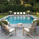 grass, grey stone paving, gorgeous pool furniture and i love the potted TGXUJUL