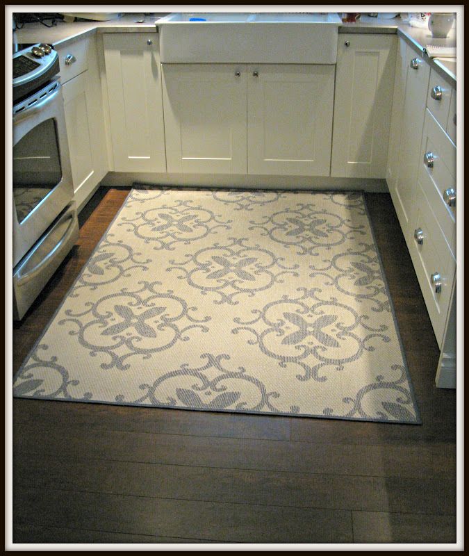 kitchen rug outdoor rug in kitchen (walmart)- great idea! warm under feet but washable AEWGFNS