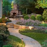 landscape ideas photo of a large traditional backyard stone landscaping in dc metro with a ALPEEDA