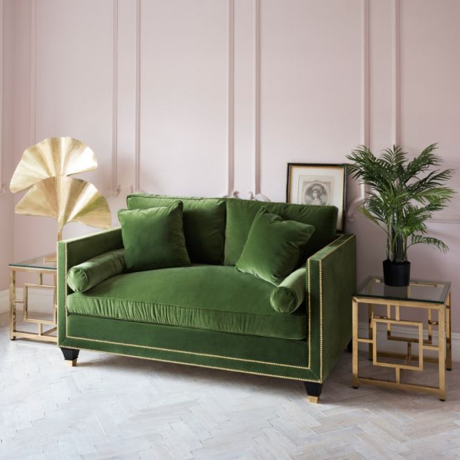 leafy green sofa with blush sugary pastel pink walls. painted panelling.  tropical BIGQSPH