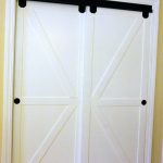 sliding closet doors diy faux barn doors on a sliding bypass closet door 02 featured on ALUATST