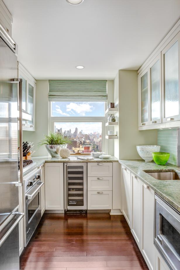 small kitchen galley kitchen exudes a cool, calm charm UICRGWH