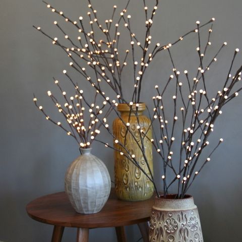 twig lights pussy willow branch lights in a vase on either side of the piano. YHBZYCA