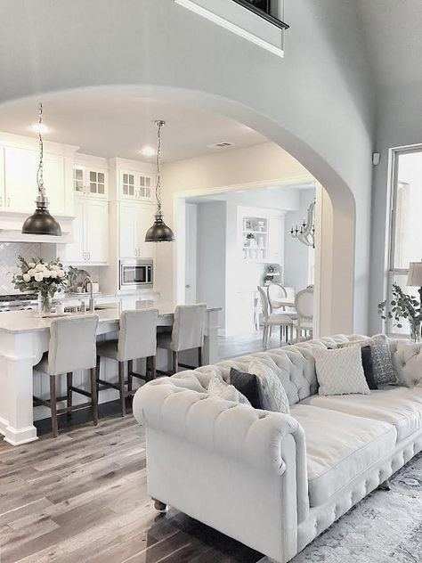 white living room neutral farmhouse kitchen with dark hardwood floors. farmhouse kitchen with  open layout. WJLGXUA