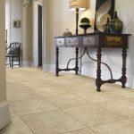 best flooring options tile flooring in entryway with front table and lamp PBDDRLR