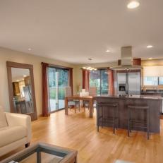 light hardwood floors modern open plan kitchen with light hardwood flooring RSJKQIC