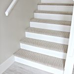 stair carpet stairs with carpet herringbone treads and painted white risers, looks like  a XCLZWKV