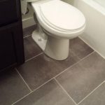 vinyl tile flooring bathroom $1.08 sq ft trafficmaster ceramica 12 in. x 24 in. coastal grey resilient OWFGAGA