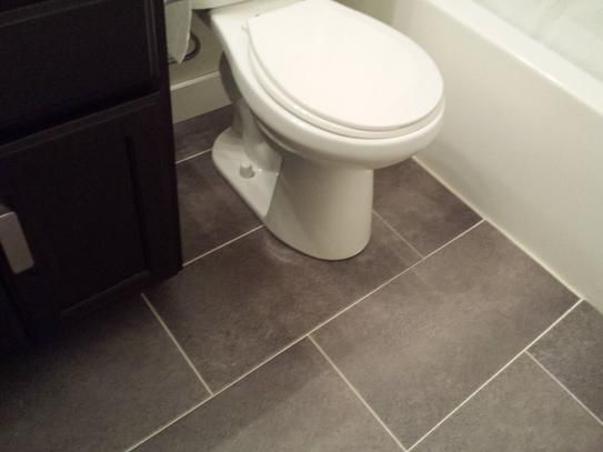 vinyl tile flooring bathroom $1.08 sq ft trafficmaster ceramica 12 in. x 24 in. coastal grey resilient OWFGAGA