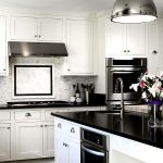 black and white kitchens with a splash of colour view in gallery glossy contemporary kitchen in black and white RCNRAEX