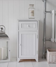 free standing bathroom cabinets with drawers a crisp white freestanding bathroom storage furniture. a narrow bathroom JKRMFIB