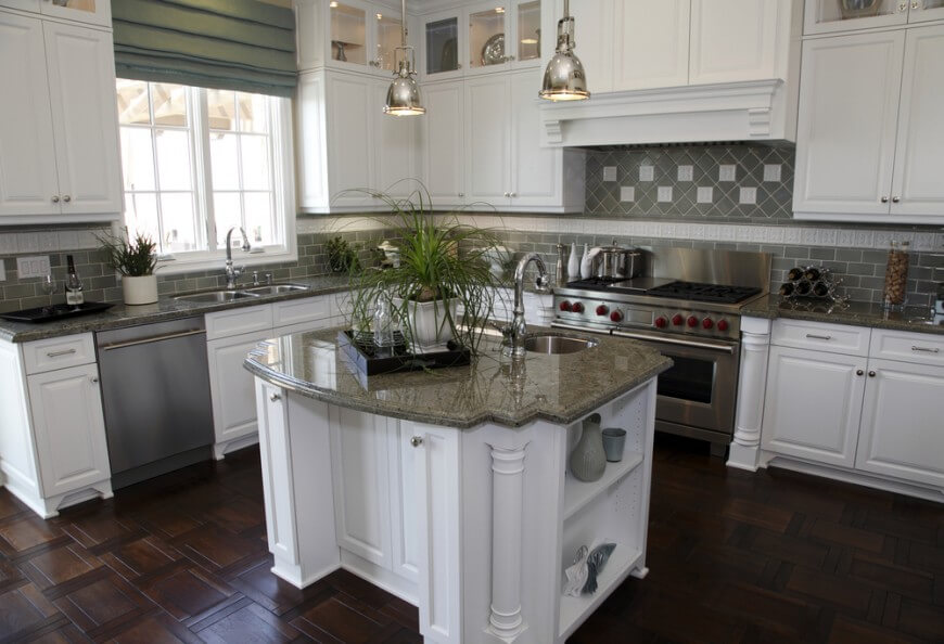 kitchen island ideas for small kitchens a white kitchen with olive-green tile backsplash and an ornate IRXEFXV