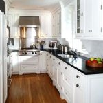 kitchen with white cabinets and black countertops white kitchen cabinets with black countertops white cabinets white XBSXIQF