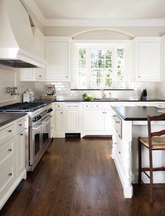 kitchen with white cabinets and black countertops white kitchen with black countertops EYTTIGW