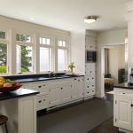 kitchen with white cabinets and black countertops york harbor maine traditional-kitchen ELFZJBF