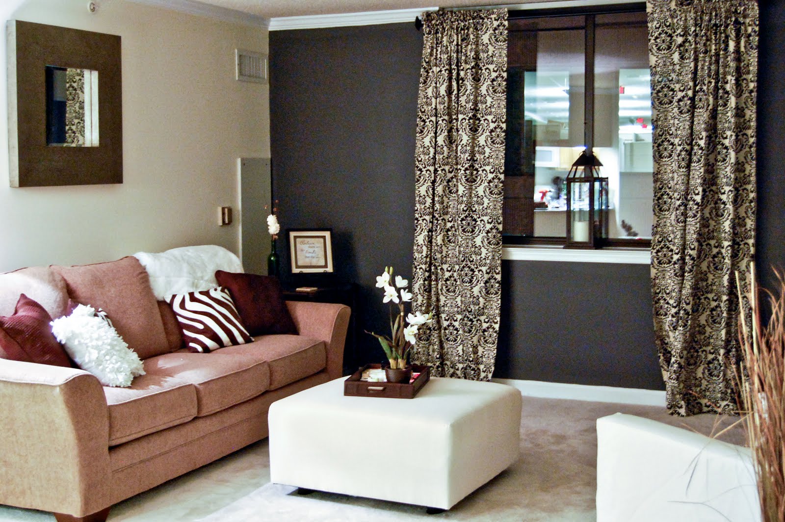 living room accent wall with brown furniture brown walls living room decor FLCXCPV