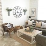 rustic wall decor ideas for living room oversized clock, wall vases, and u201cstayu201d sign FPLJXKK
