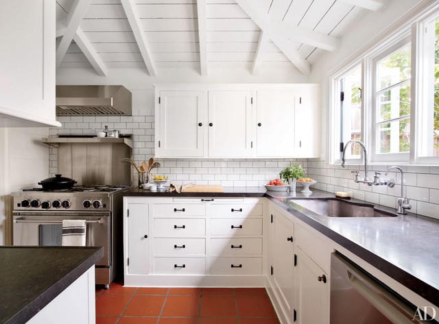 white kitchen cabinets with black countertops 25 black countertops to inspire your kitchen renovation OBSNPLQ
