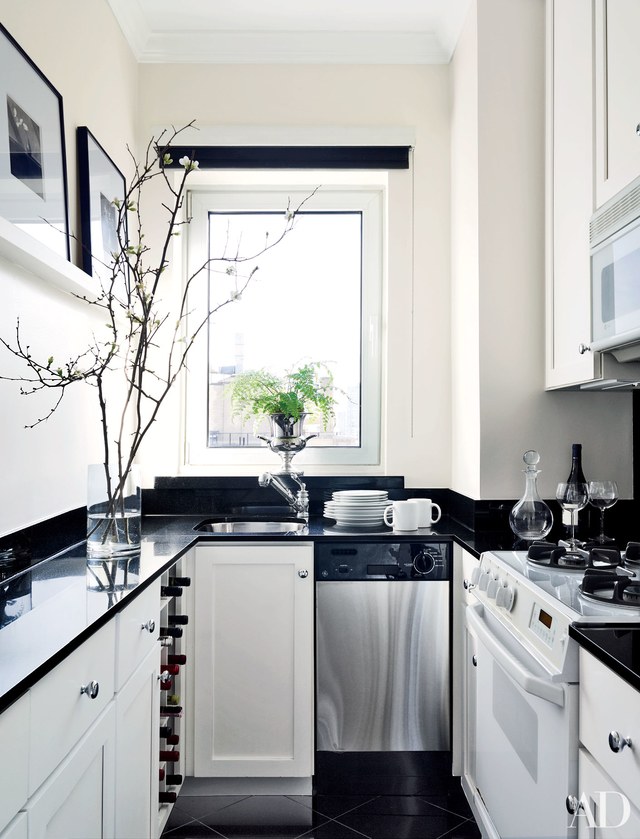 white kitchen cabinets with black countertops 25 black countertops to inspire your kitchen renovation PGVFFDS