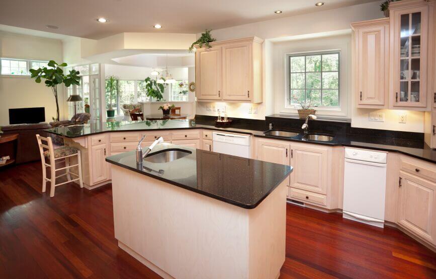 white kitchen cabinets with black countertops this lovely kitchen continues the bright, open feel apparent in VKXVMHS
