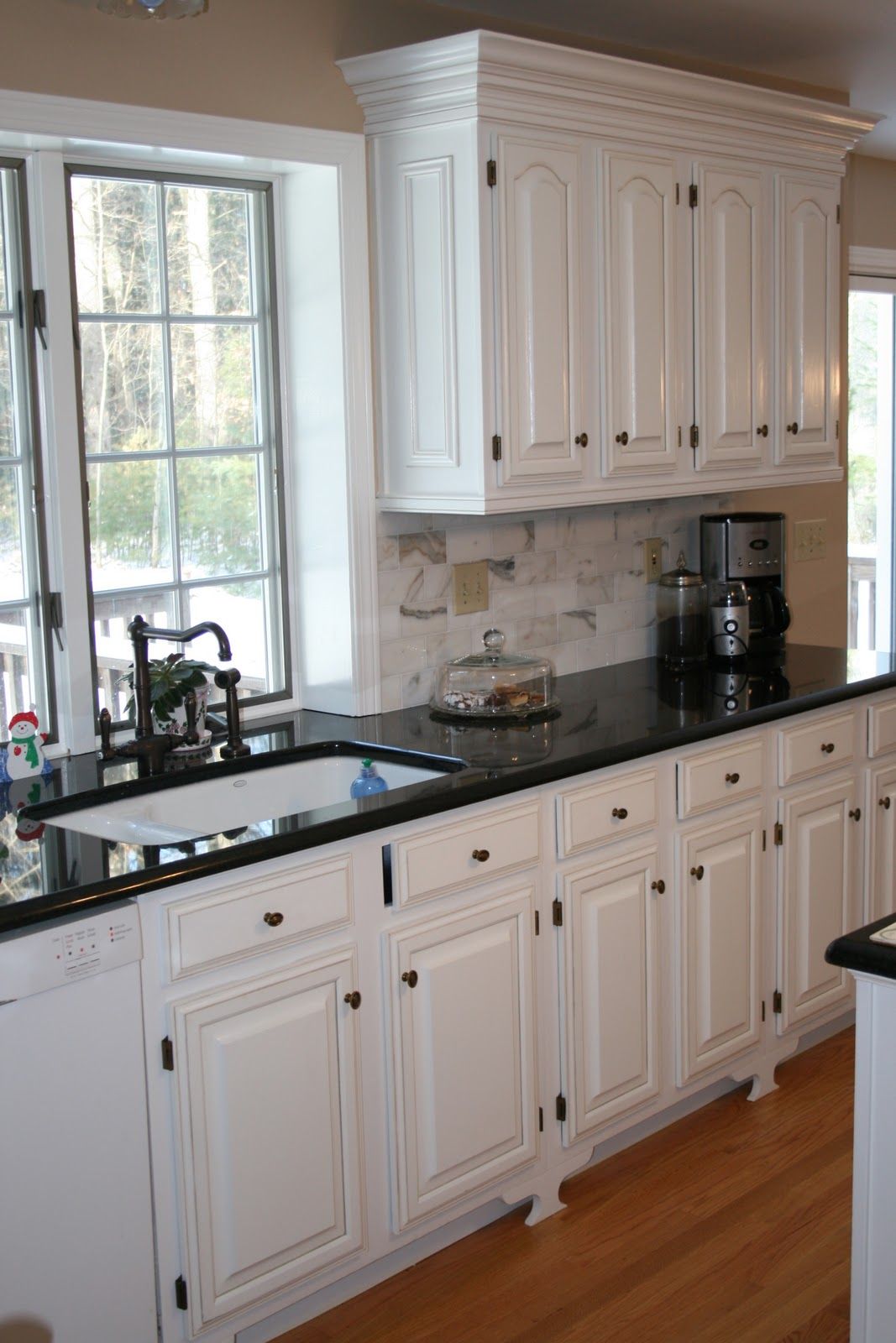 white kitchen cabinets with black countertops white cabinets black countertops and that faucet ZDHVCSE