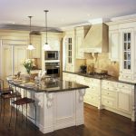 white kitchen cabinets with dark wood floors this kitchen is very elegant and gorgeous. the natural hardwood ATHRVGL