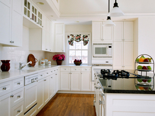 white kitchen cabinets with white appliances JWFKPQA