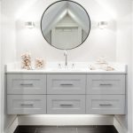 Beautiful floating vanity and love the floors. Beautiful use of