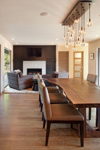 I like the light fixture - it goes well with the live edge table .