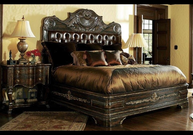 1 High end master bedroom set carvings and tufted leather .