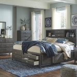 Caitbrook Queen Storage Bed with 8 Drawers | Ashley Furniture .