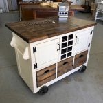 Small industrial style kitchen island with plenty of storage space .