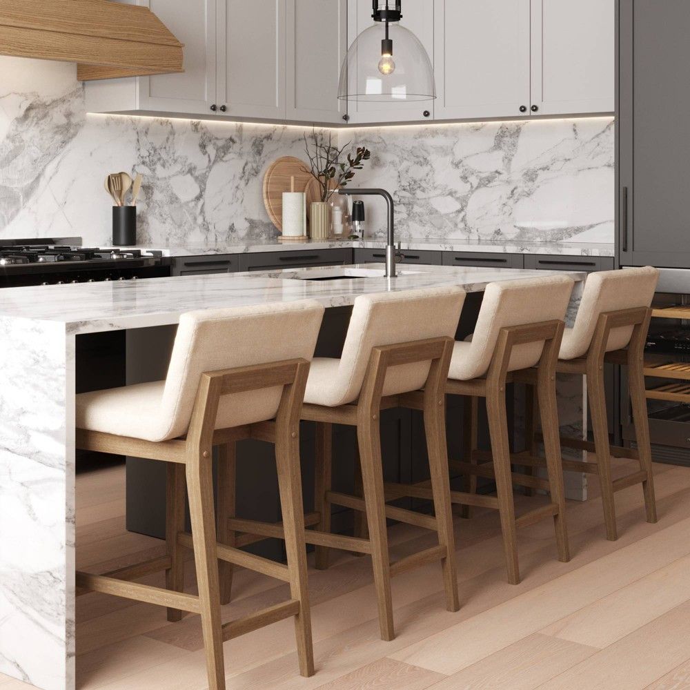 How to Incorporate a Kitchen Island with
Stools into Your Home Design