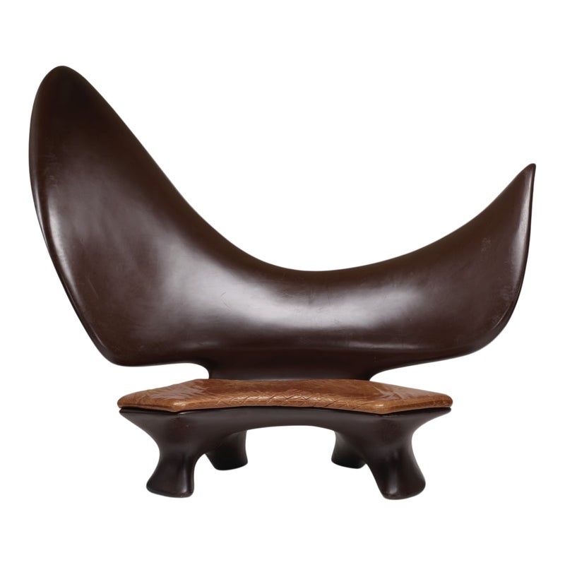 Settees- leather settees are a great addition for your living room