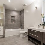 bathroom design 4 tags contemporary full bathroom with limestone counters, wall sconce,  grey GJMTDVA
