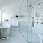 bathroom design white bathroom with silver tub RIEYUUM