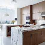contemporary kitchens cerused-oak cabinetry lines a rockwell group-designed manhattan penthouseu0027s  kitchen. the wall PXLLNHT