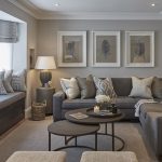 Grey Living Room white frames above dark grey sofa EGKPCFG