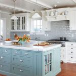 kitchen backsplash blue island livening up the grey subway tile backsplash and white cabinetry LDUJTIS