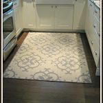 kitchen rug outdoor rug in kitchen (walmart)- great idea! warm under feet but washable AEWGFNS