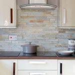 kitchen tile ideas hi-gloss cream kitchen EMFWLIB