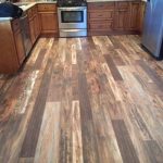 laminate wood flooring in kitchen- light, medium and dark wood | gainey AUIVNNU