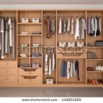 wooden wardrobe closet full of different things. 3d illustration RKWVDQV