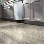 wood tile flooring imitates wood in planks with light, dark or distressed KIJLSQW