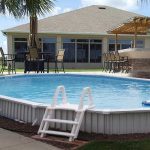 above ground pools that look like in ground above-ground pool in the ground XFNLAJS