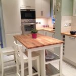 butcher block kitchen island with seating butcher block island. perfect but with stools and seating on both HMAGZVD